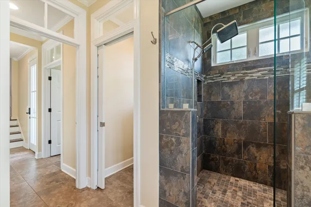 a view of a bedroom with washer and dryer