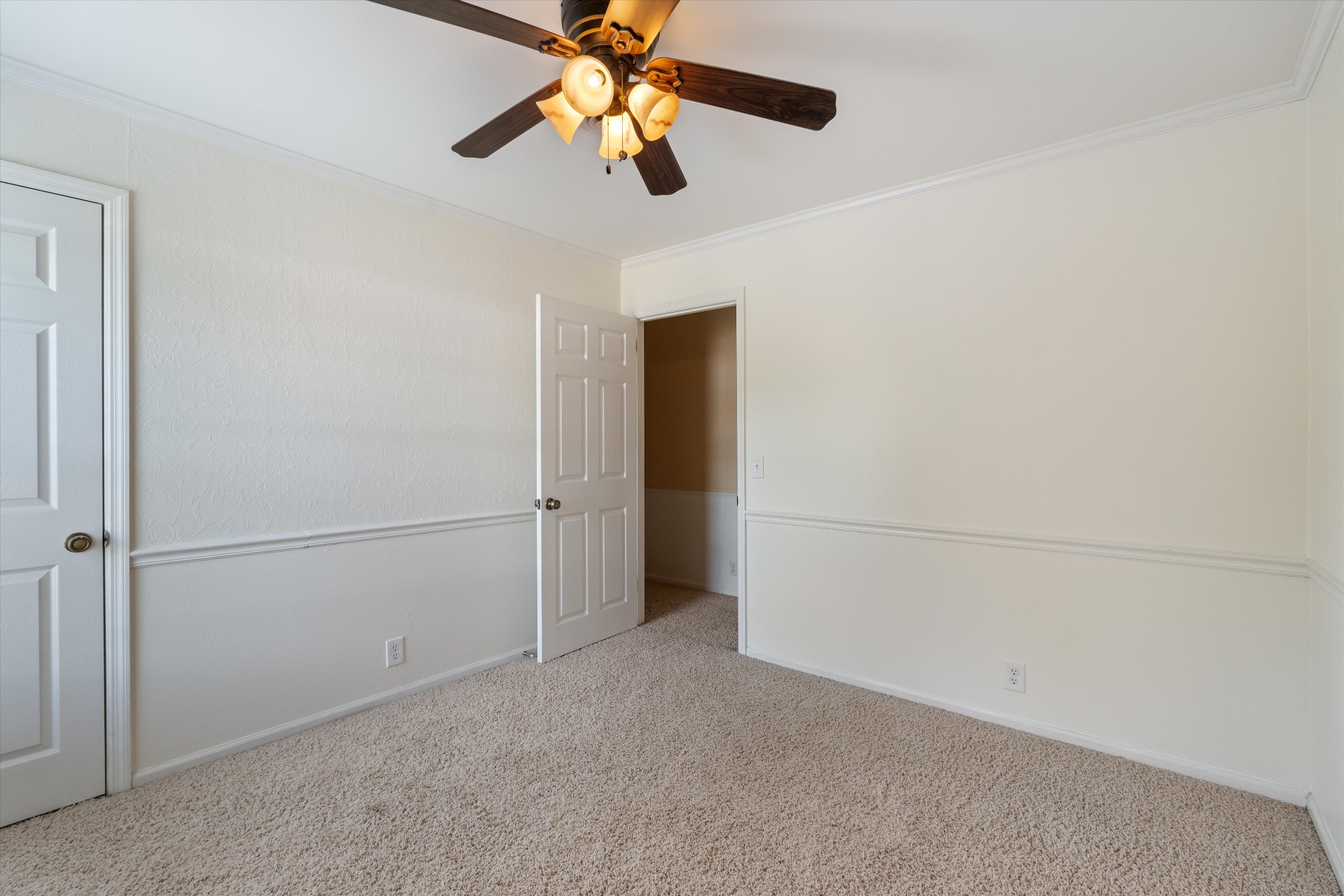 1967 Liebengood Road Goodlettsville, TN 37072 - Photo 49 of 57 an empty room with closet and a chandelier fan