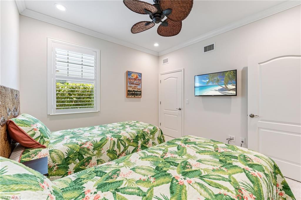 6948 Avalon Circle, Unit 604 Naples, FL 34112 - Photo 21 of 33 Bedroom with ornamental molding, ceiling fan, recessed lighting, and visible vents