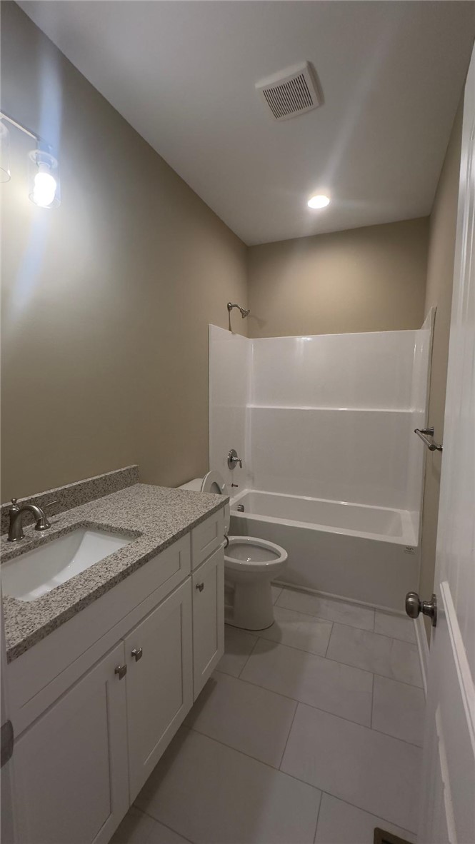 247 Vera Holliday Road Six Mile, SC 29682 - Photo 17 of 20 This bathroom features elegant granite counters, a clean vanity, and a refreshing shower and tub combination.