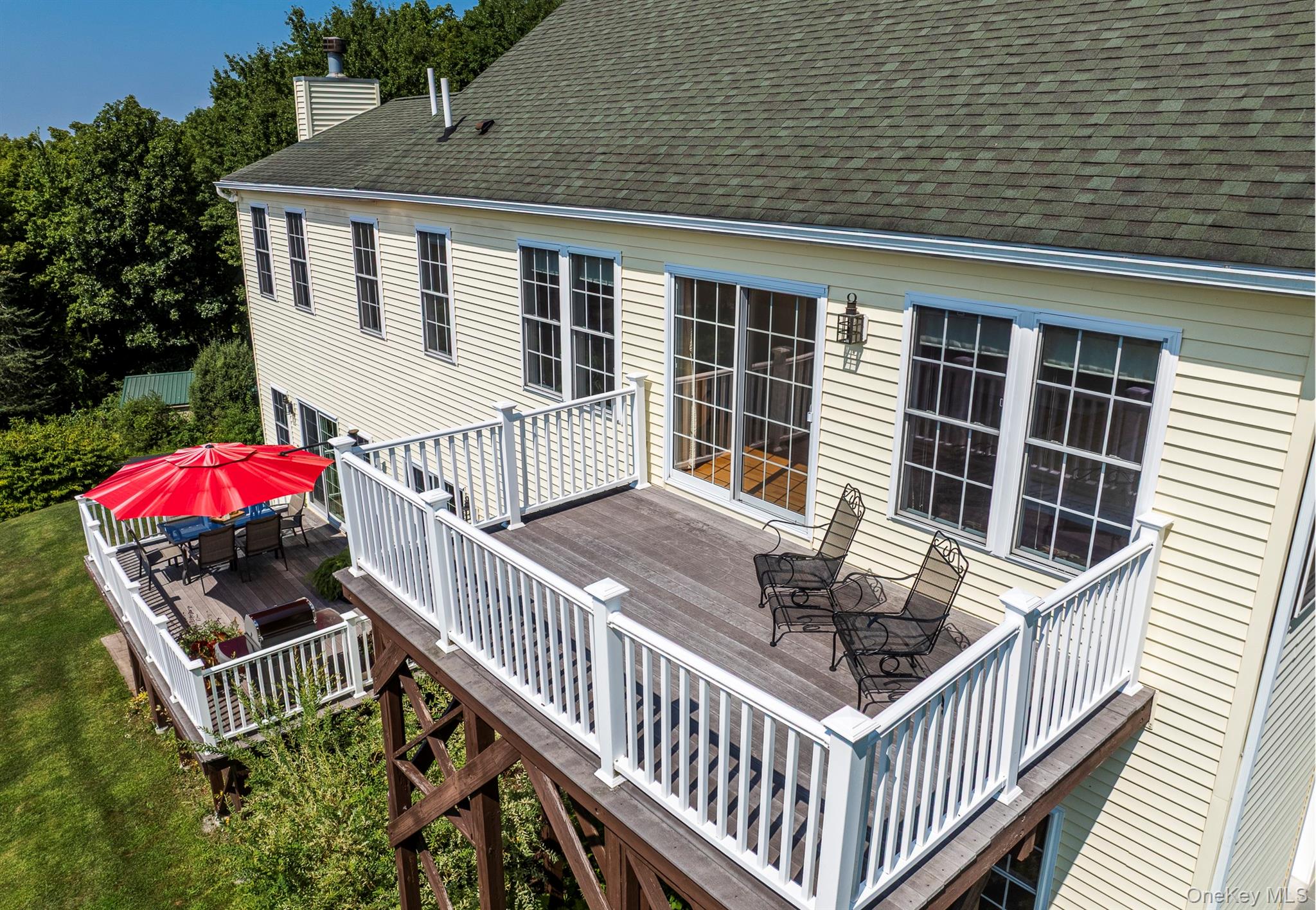 74 Willow Brook Ridge Clinton Corners, NY 12514 - Photo 7 of 44 Decks outside kitchen on the 1st floor and outside of the Primary Bedroom with western mountain views.