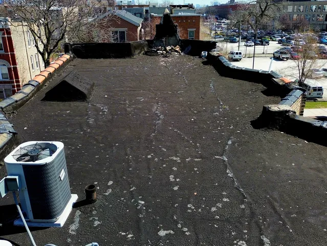 an aerial view of a houses with outdoor space