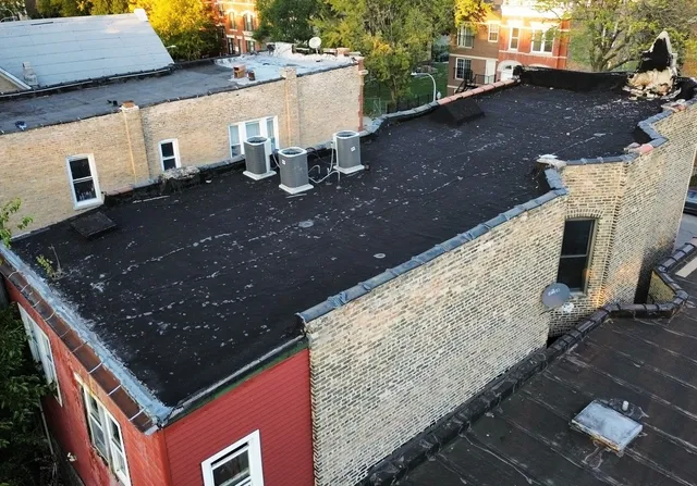a bathroom with a bathtub and window