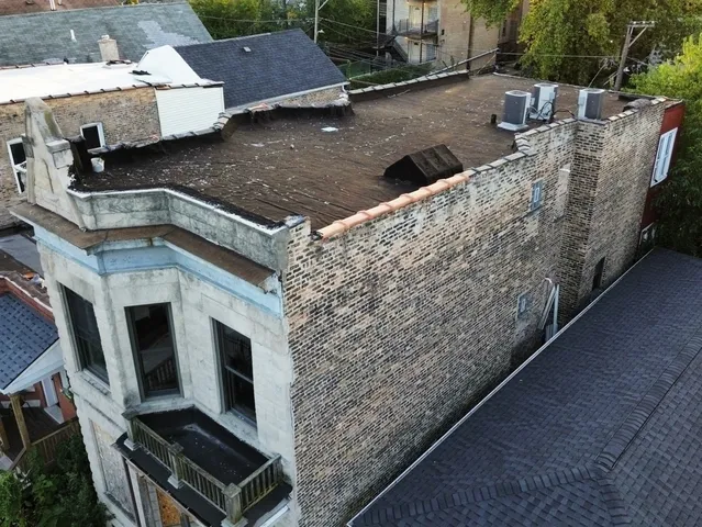 a view of a room with large windows and a large window