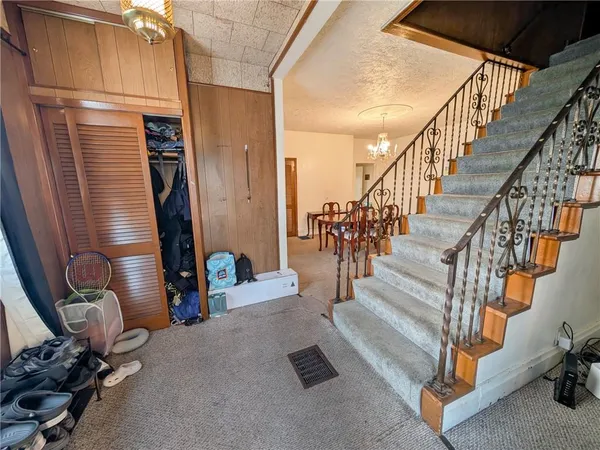 a view of entryway with wooden floor