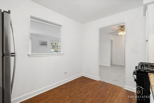 a view of empty room with closet area