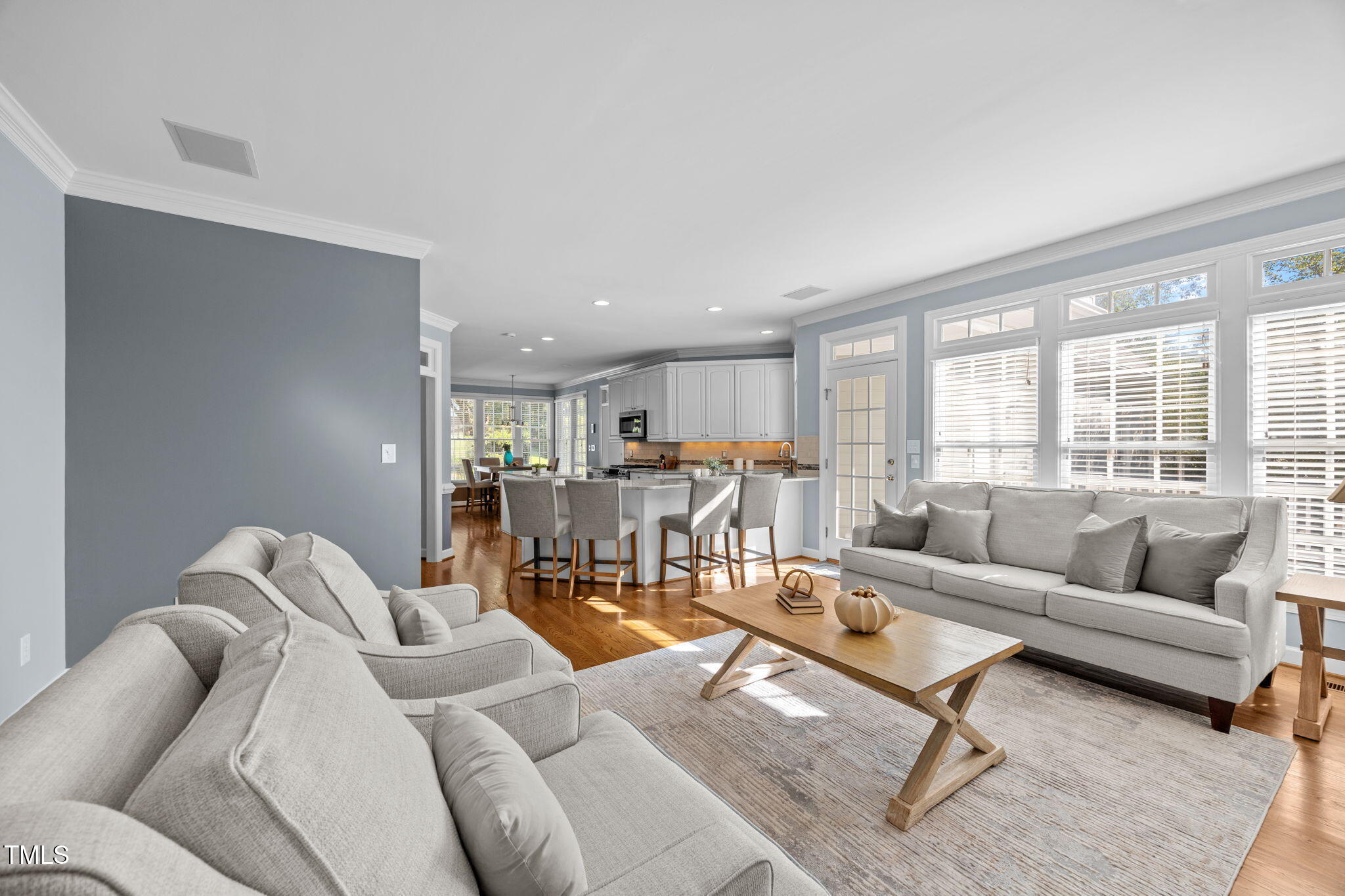 8001 Kukui Court Raleigh, NC 27613 - Photo 13 of 51 a living room with furniture and a large window