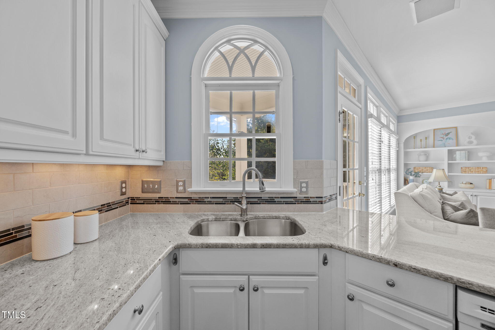 8001 Kukui Court Raleigh, NC 27613 - Photo 15 of 51 a kitchen with a sink and cabinets