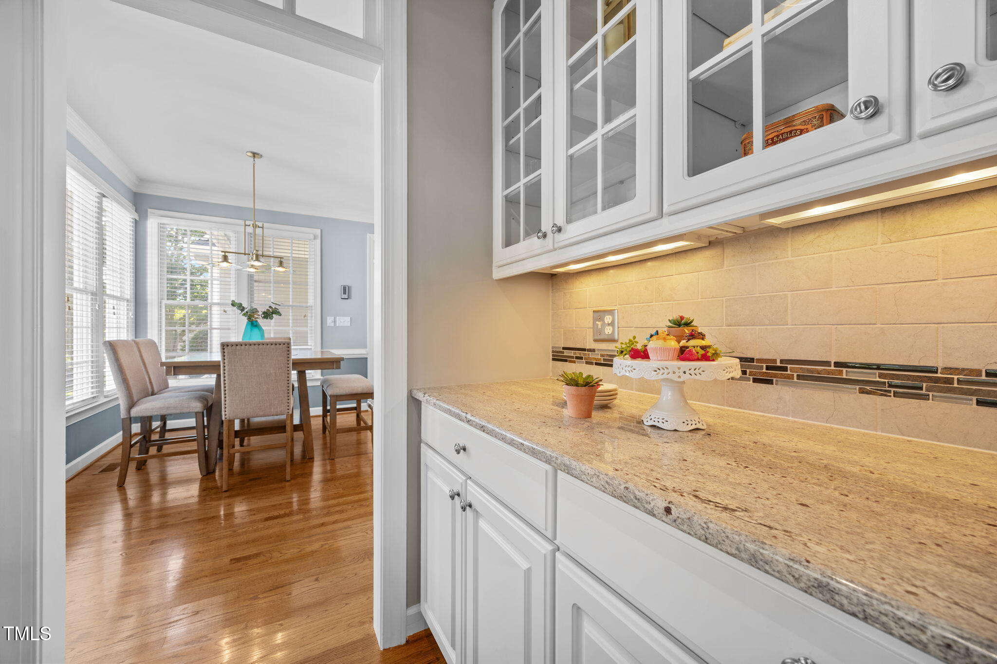 8001 Kukui Court Raleigh, NC 27613 - Photo 25 of 51 a kitchen with sink and cabinets