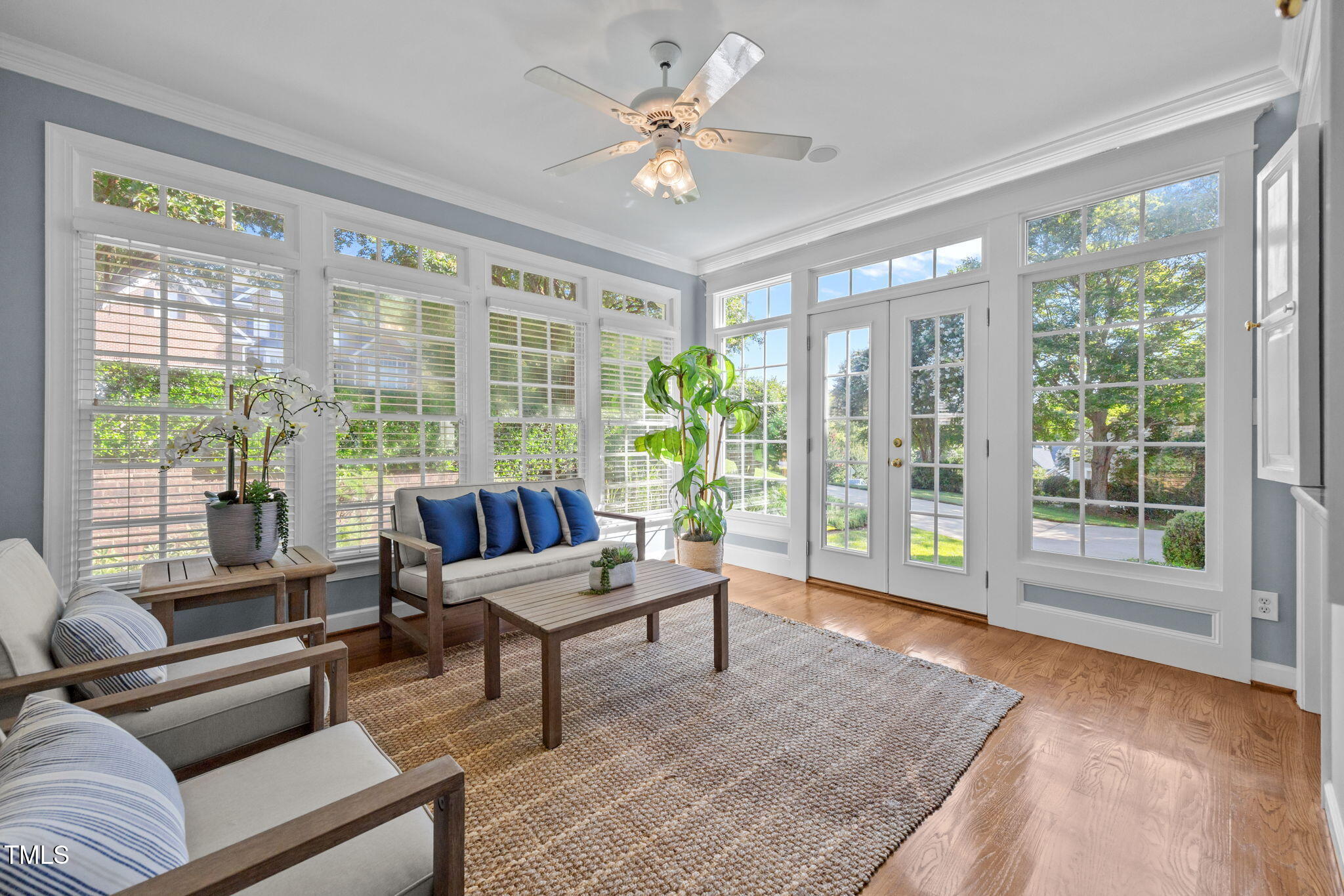 8001 Kukui Court Raleigh, NC 27613 - Photo 28 of 51 a living room with furniture and a large window with outer view