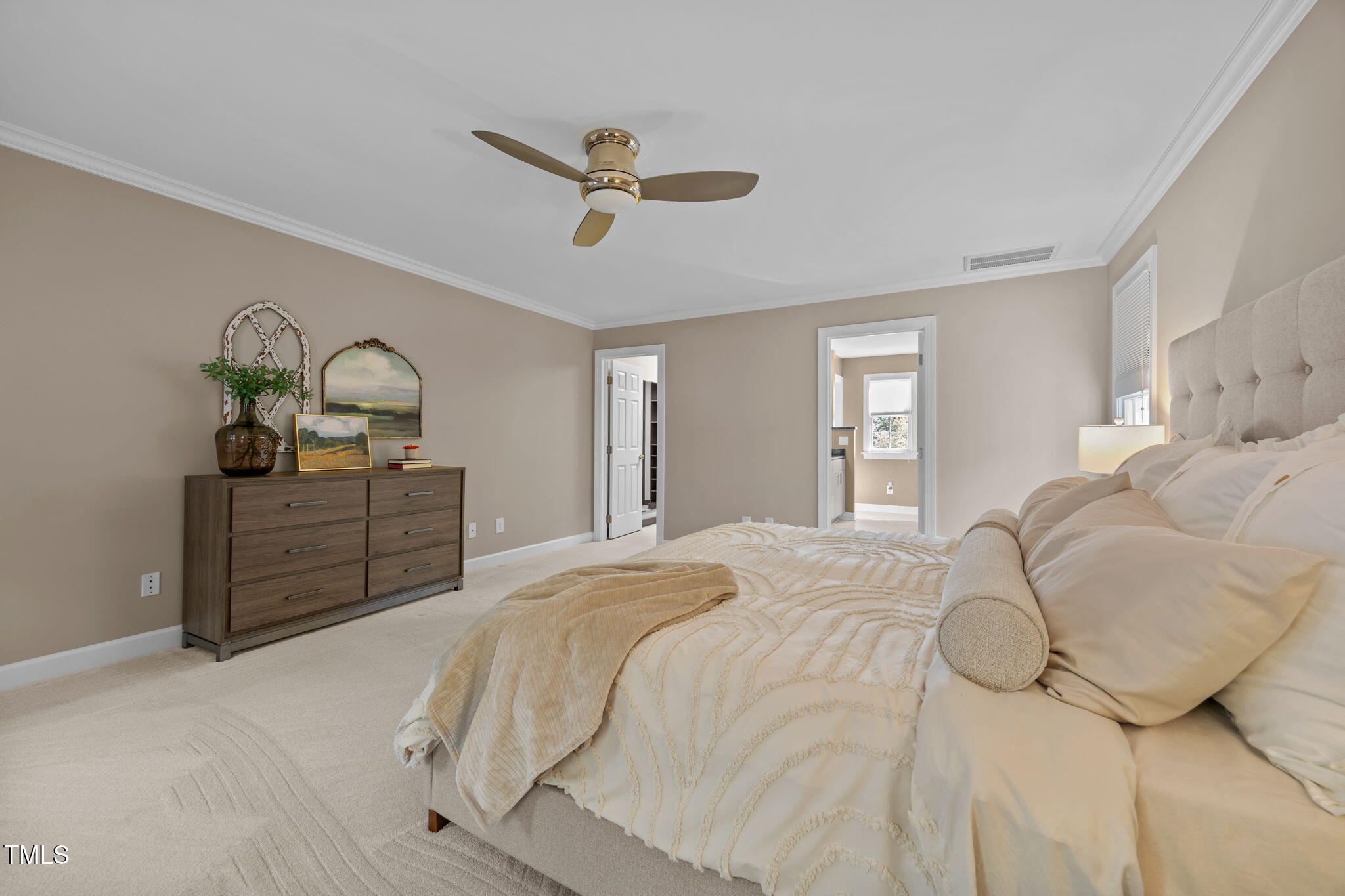 8001 Kukui Court Raleigh, NC 27613 - Photo 32 of 51 a bedroom with a bed and window