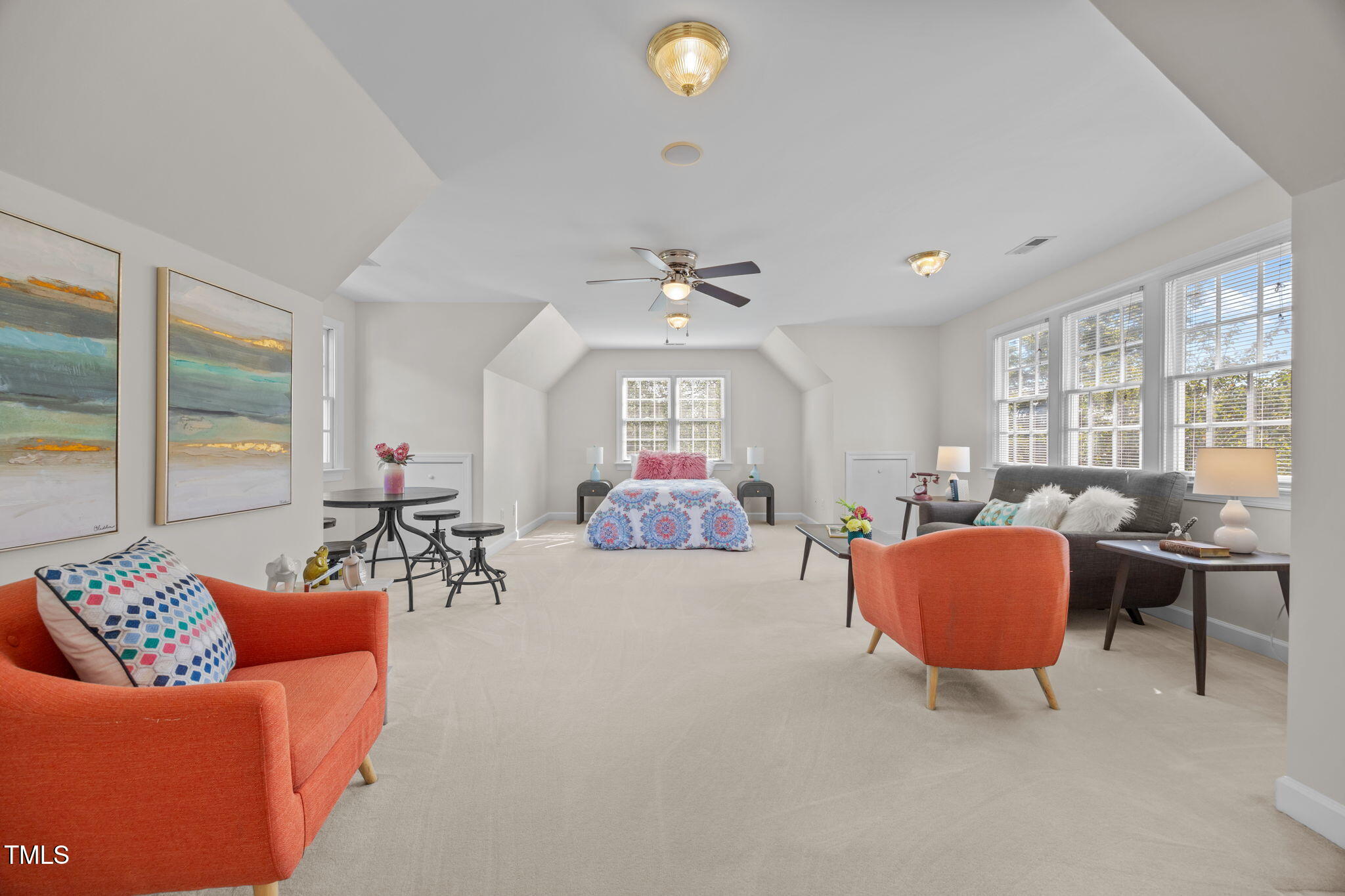 8001 Kukui Court Raleigh, NC 27613 - Photo 38 of 51 a living room with furniture and a large window