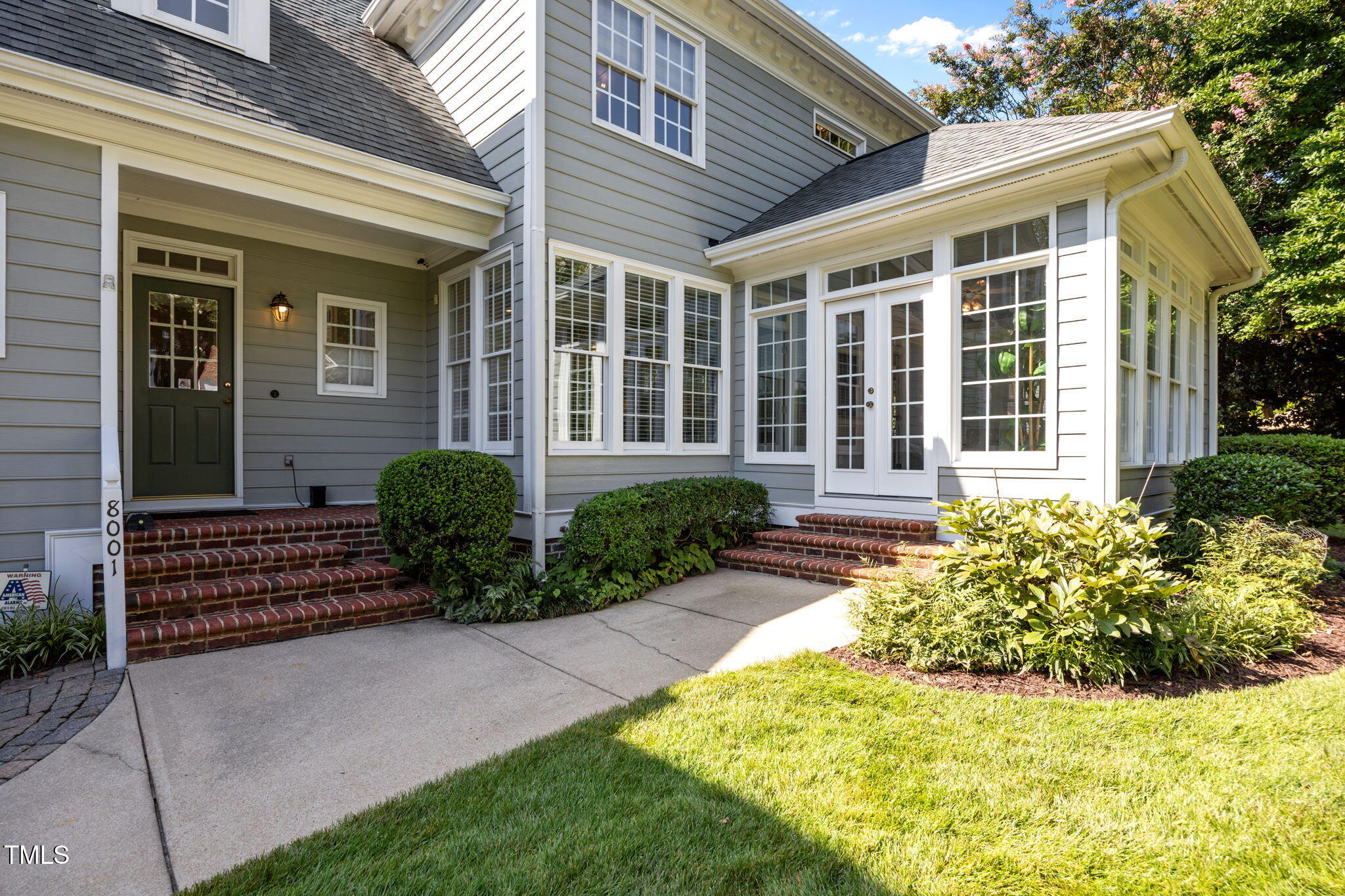 8001 Kukui Court Raleigh, NC 27613 - Photo 40 of 51 a front view of a house with garden
