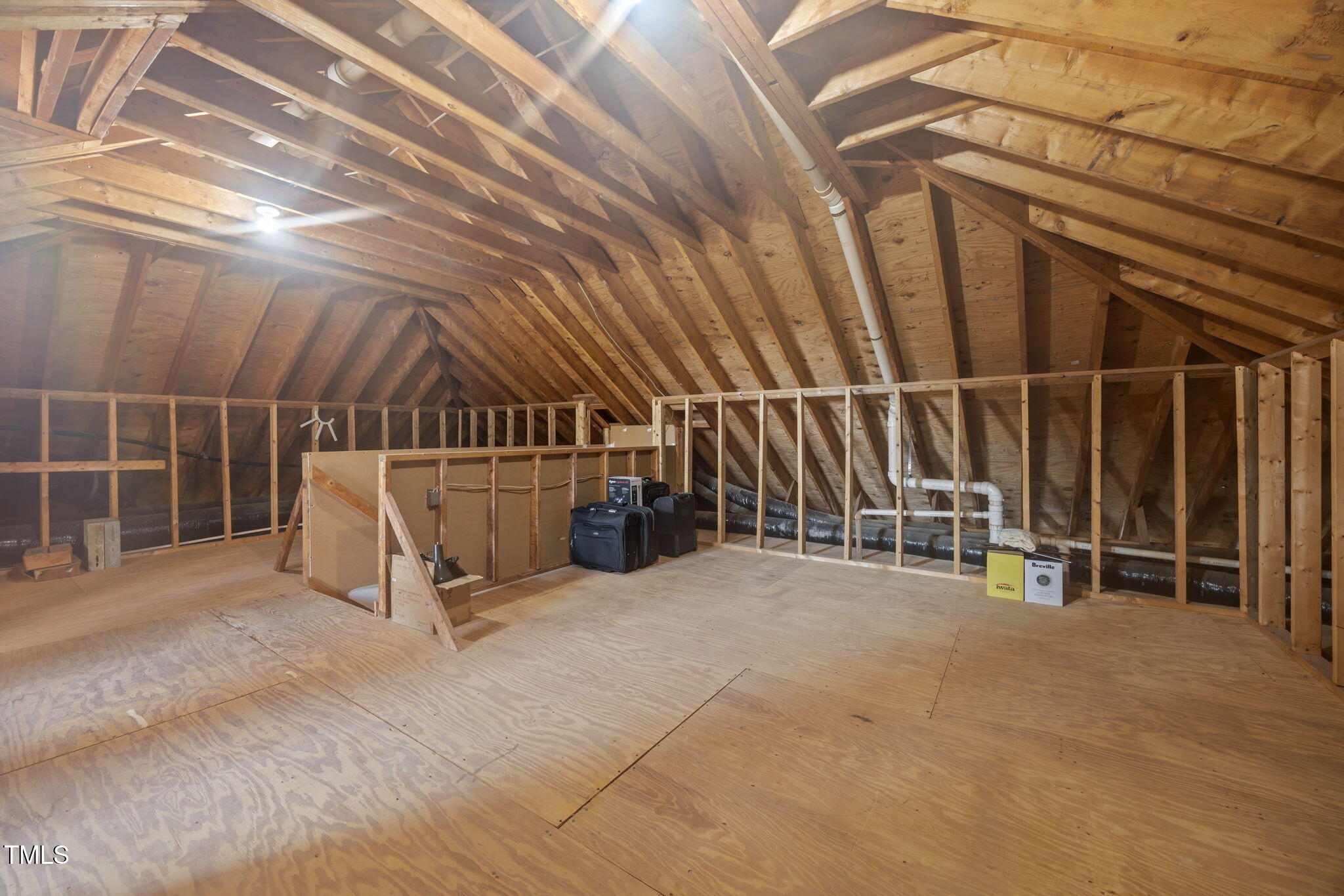 8001 Kukui Court Raleigh, NC 27613 - Photo 43 of 51 a view of an empty room with wooden walls