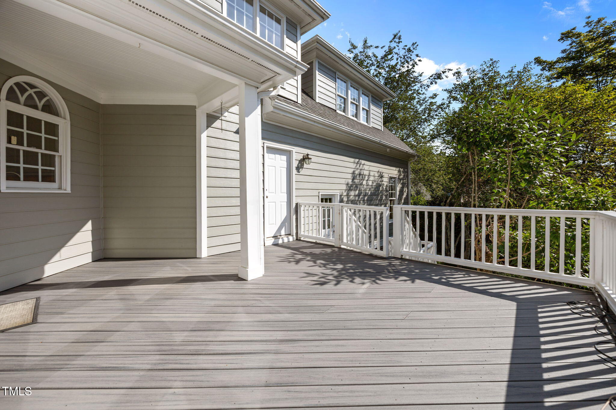 8001 Kukui Court Raleigh, NC 27613 - Photo 44 of 51 a view of a balcony with wooden floor