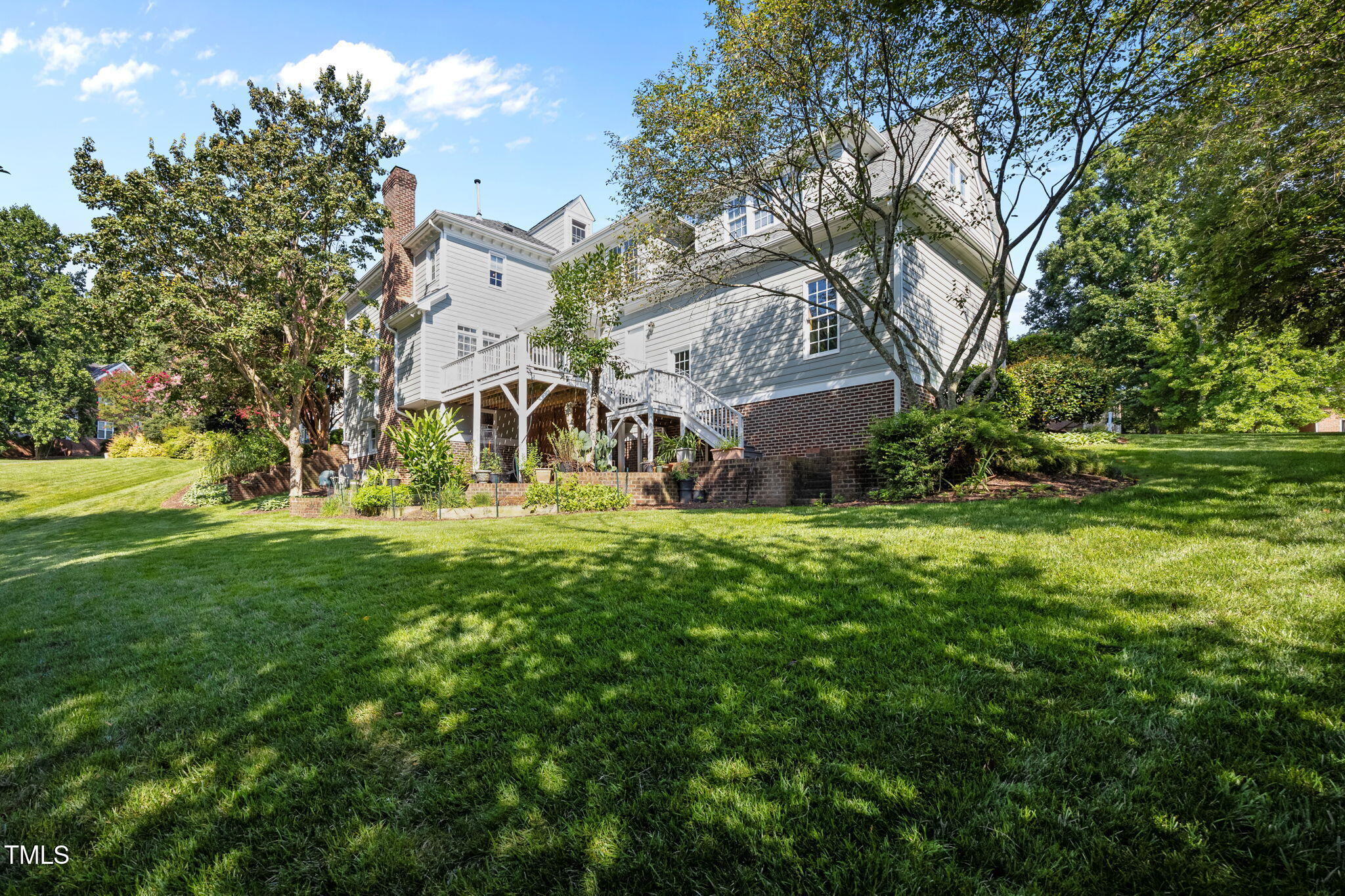 8001 Kukui Court Raleigh, NC 27613 - Photo 45 of 51 a view of house with a yard