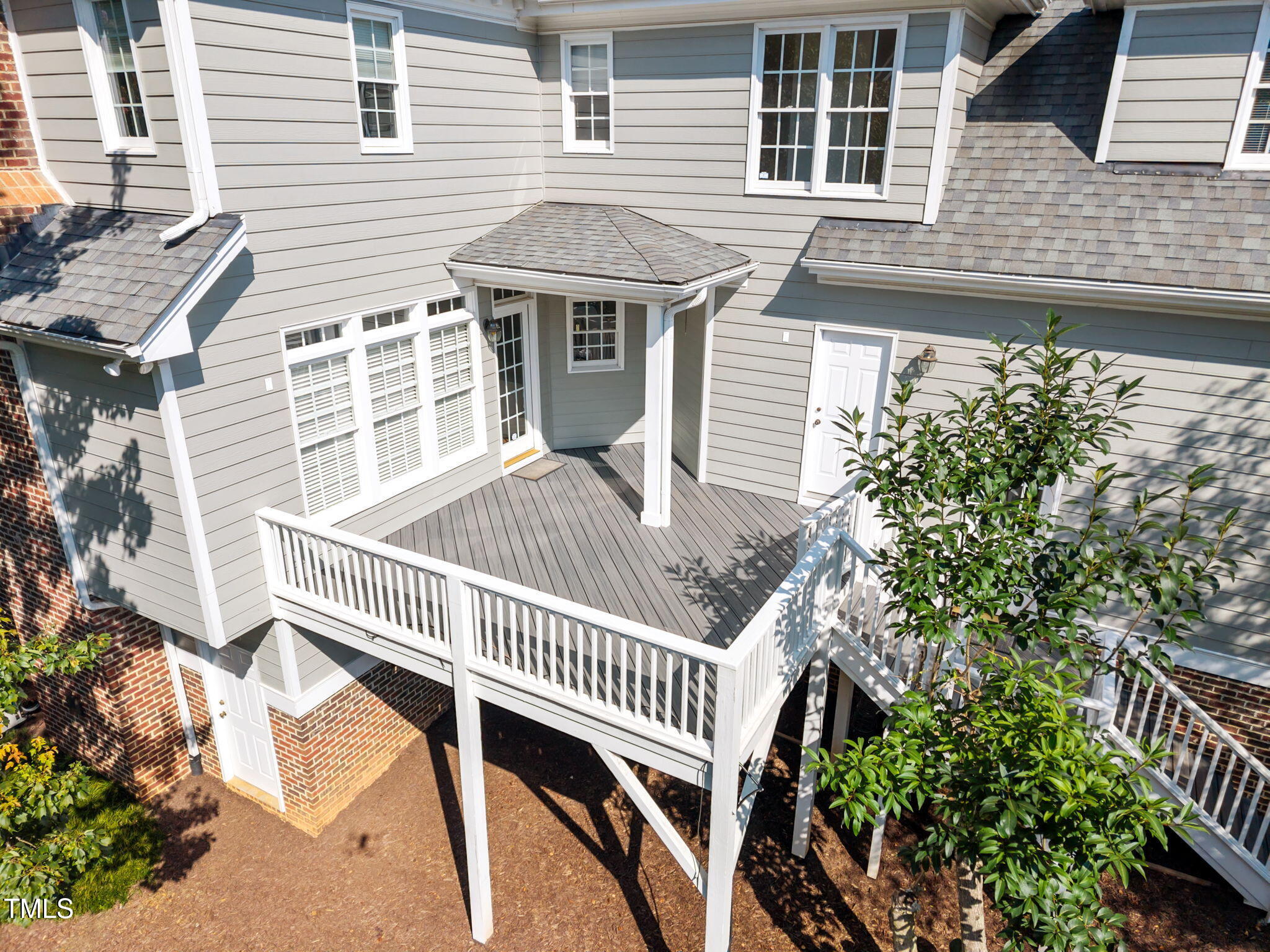 8001 Kukui Court Raleigh, NC 27613 - Photo 47 of 51 a front view of a house with a porch