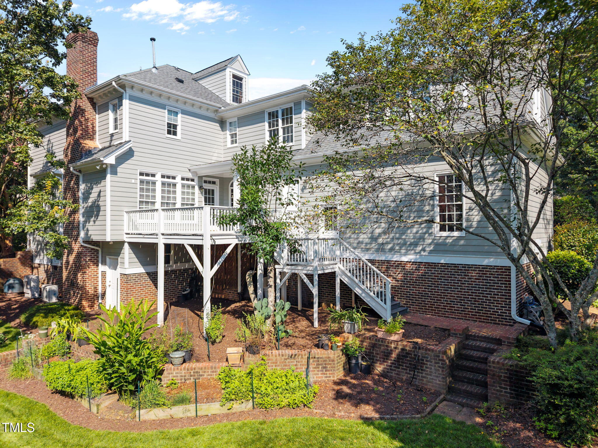 8001 Kukui Court Raleigh, NC 27613 - Photo 49 of 51 front view of a house with a yard