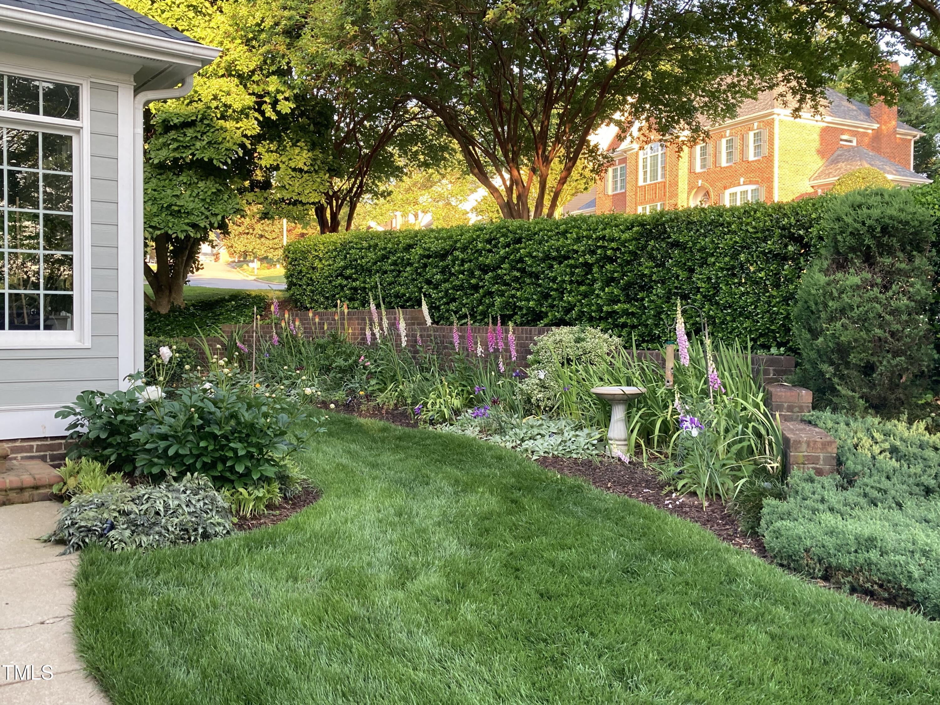8001 Kukui Court Raleigh, NC 27613 - Photo 50 of 51 a view of yard with green space