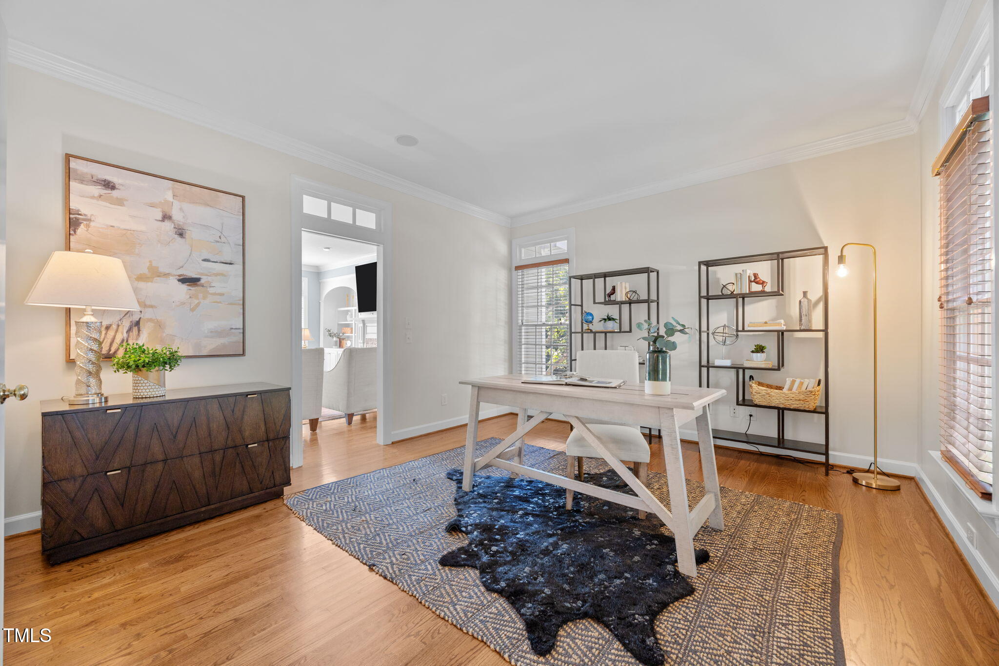 8001 Kukui Court Raleigh, NC 27613 - Photo 6 of 51 a living room with furniture and a wooden floor
