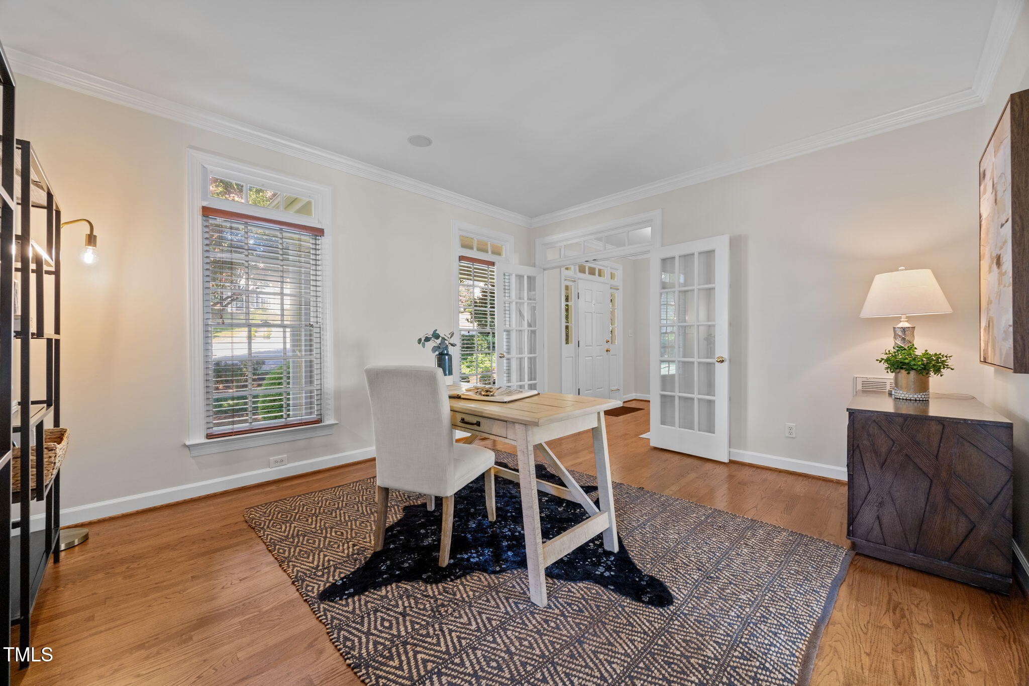 8001 Kukui Court Raleigh, NC 27613 - Photo 7 of 51 a view of a dining room with furniture and wooden floor