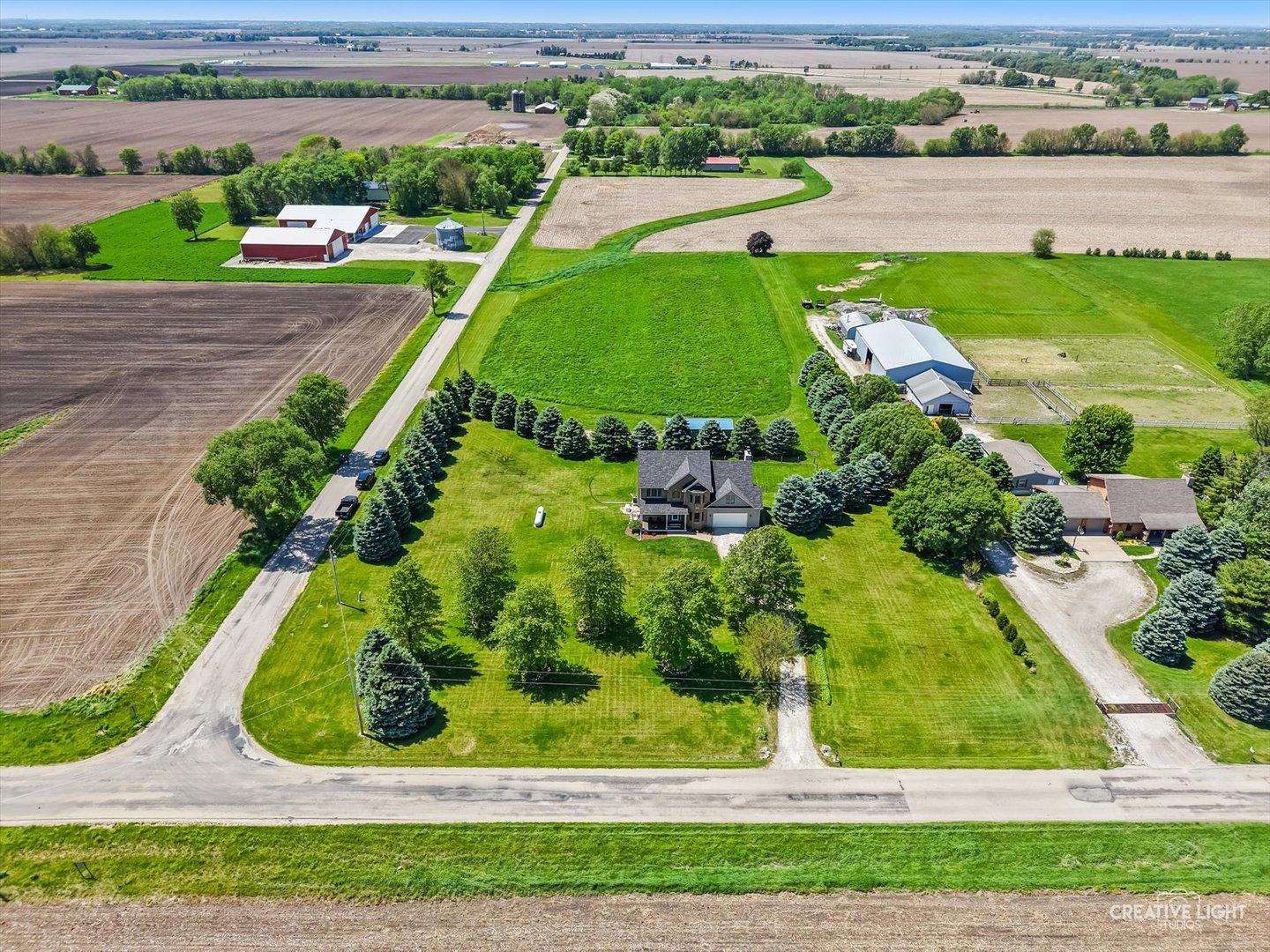 13495 Fennel Road Newark, IL 60541 - Photo 43 of 43 a view of a garden with a lake