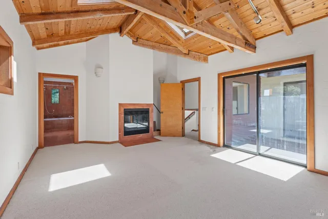 a view of empty room with windows