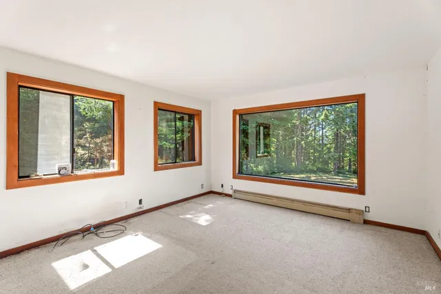 an empty room with windows