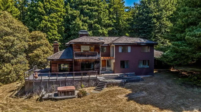 a view of a house with roof deck