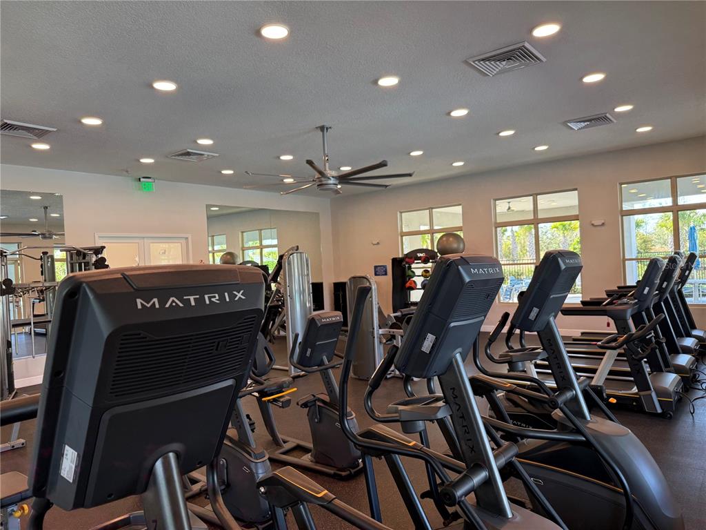 1895 Hickory Bluff Road Kissimmee, FL 34744 - Photo 12 of 17 a view of a room with gym equipment