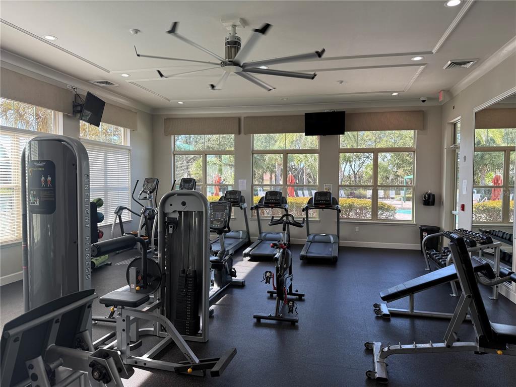 1895 Hickory Bluff Road Kissimmee, FL 34744 - Photo 13 of 17 a view of a room with gym equipment