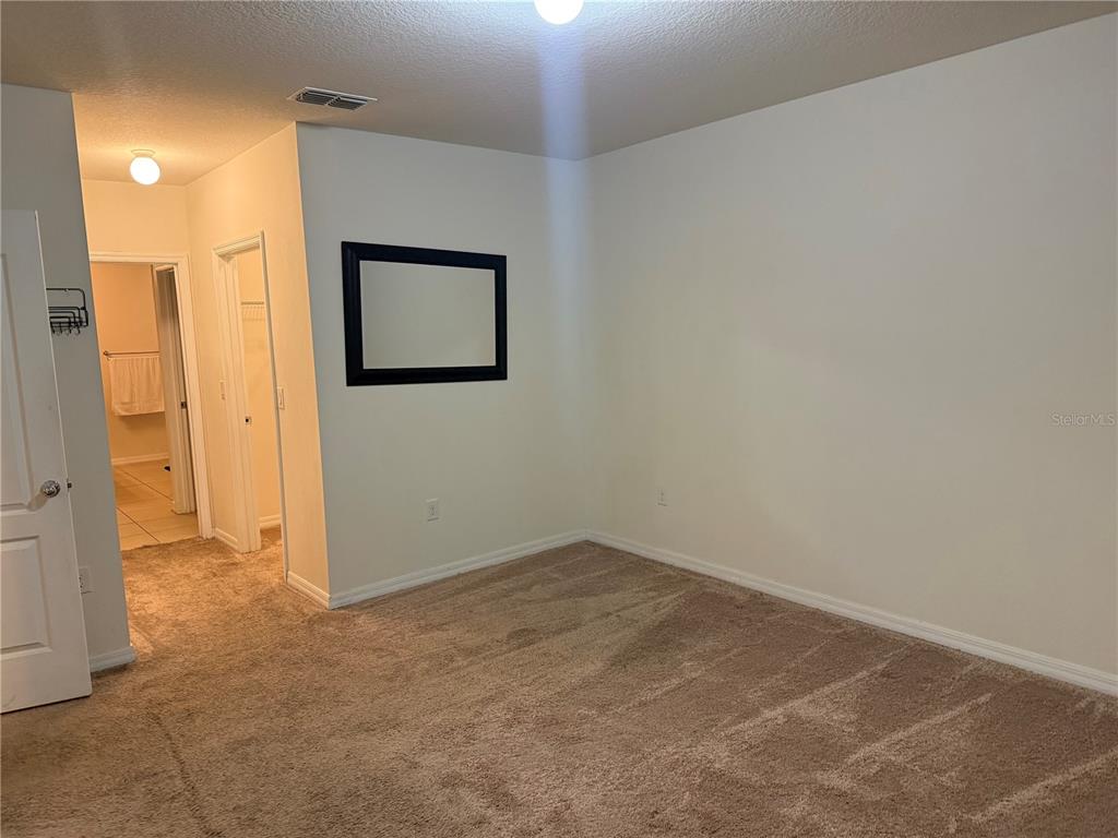 1895 Hickory Bluff Road Kissimmee, FL 34744 - Photo 7 of 17 a view of an empty room