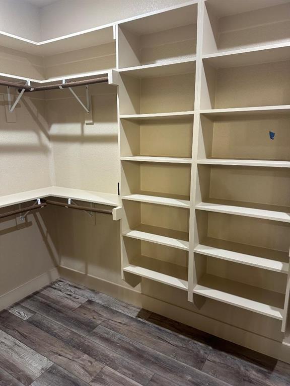 233 Jayden Lane Loving, TX 76460 - Photo 19 of 40 a view of walk in closet with empty racks