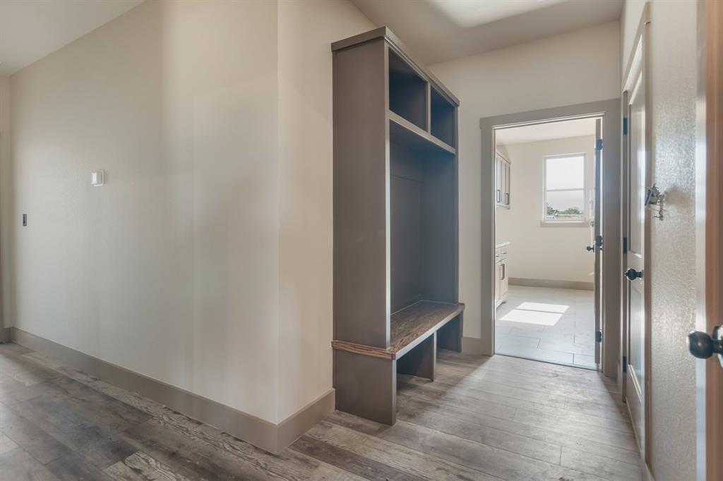 233 Jayden Lane Loving, TX 76460 - Photo 24 of 40 an empty room with wooden floor