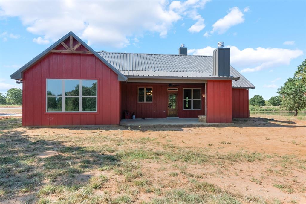 233 Jayden Lane Loving, TX 76460 - Photo 30 of 40 a view of a house with a yard