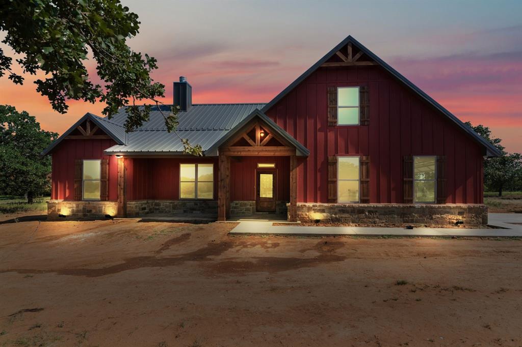 233 Jayden Lane Loving, TX 76460 - Photo 5 of 40 a front view of a house with a yard
