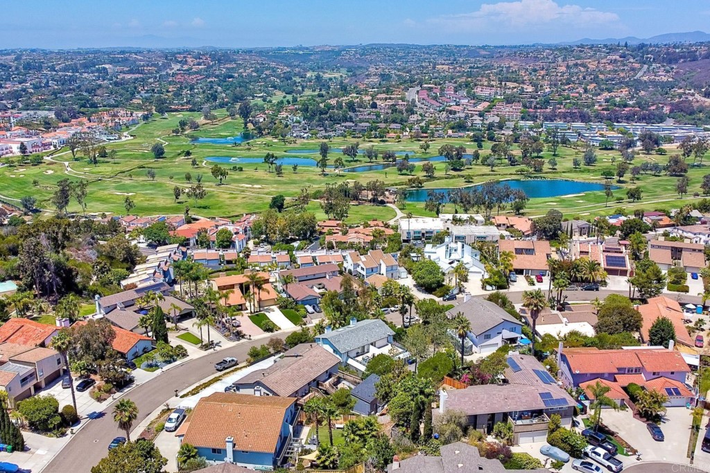 2425-27 Torrejon Place Carlsbad, CA 92009 - Photo 60 of 61 an aerial view of residential houses with outdoor space and trees