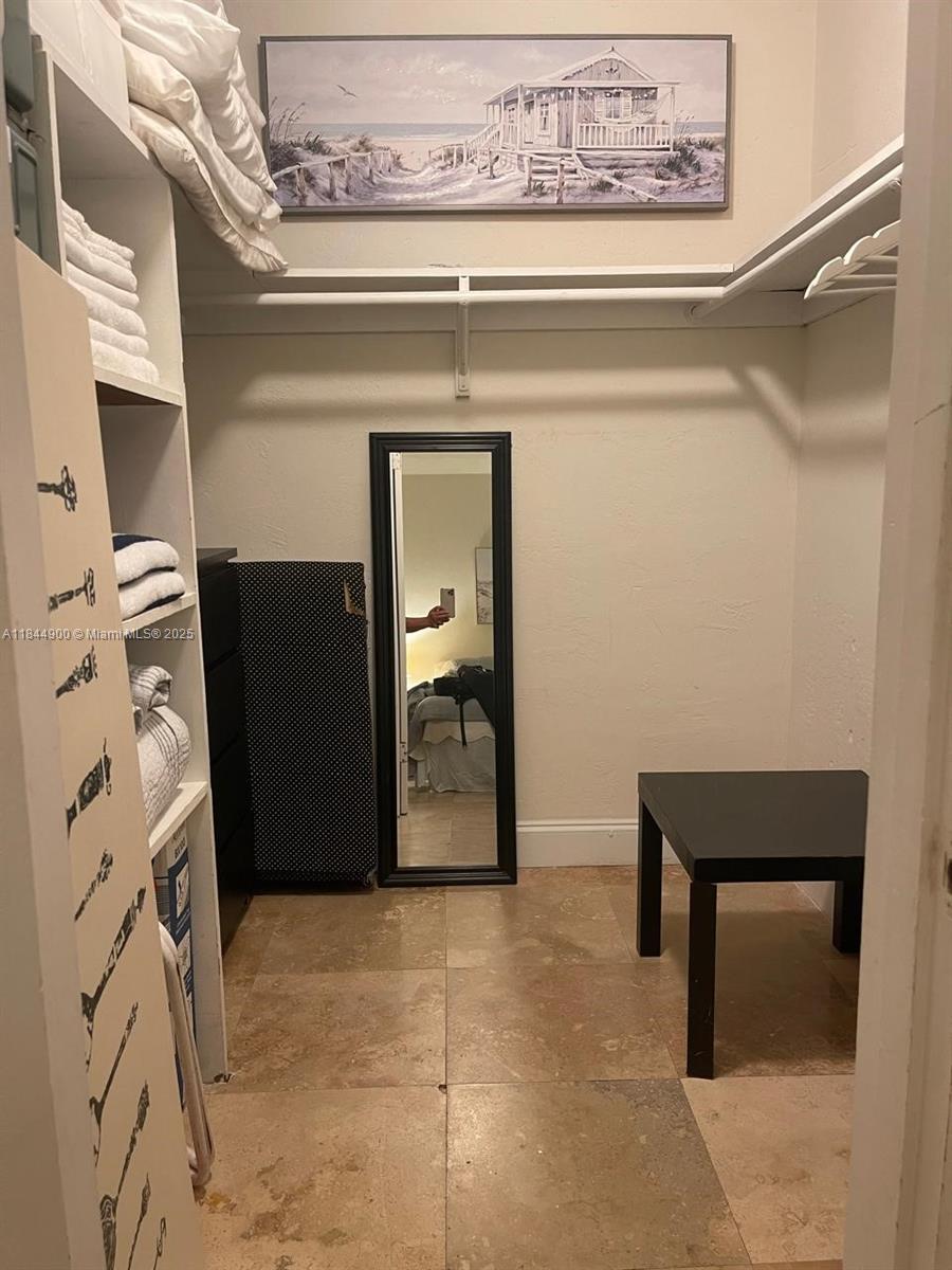 100 Sunrise Drive, Unit 27 Key Biscayne, FL 33149 - Photo 14 of 24 a view of a entryway door of the house