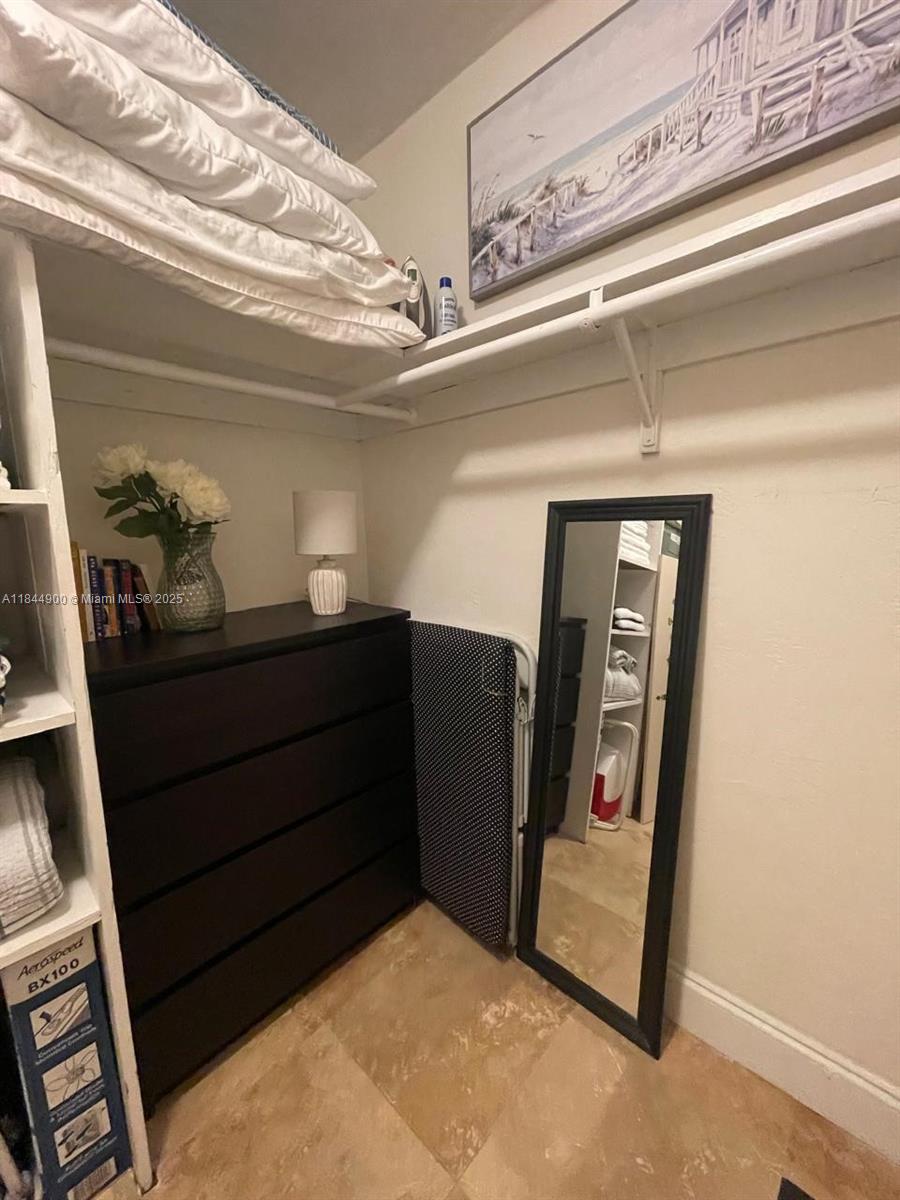 100 Sunrise Drive, Unit 27 Key Biscayne, FL 33149 - Photo 16 of 24 a view of a hallway