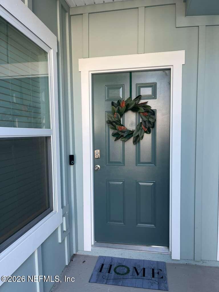 1685 Bridger Trace Middleburg, FL 32068 - Photo 13 of 13 a view of entryway with a hallway