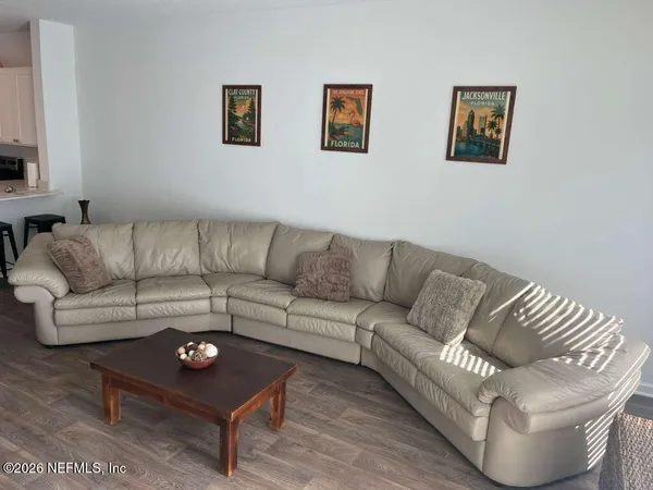 a living room with furniture and a couch