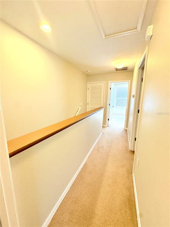 10812 Kensington Park Avenue Riverview, FL 33578 - Photo 10 of 20 a view of a big room with wooden floor