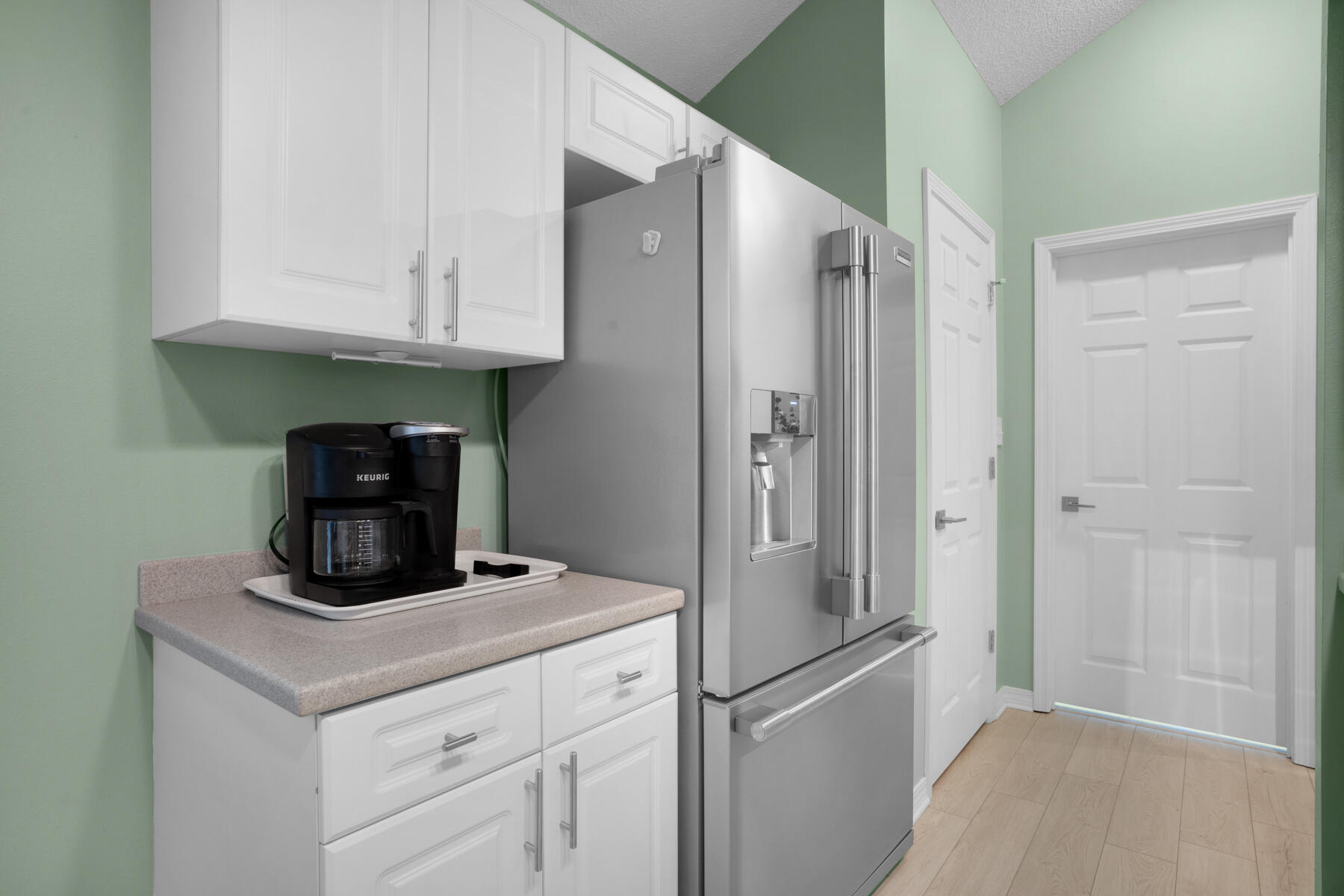 375 Bay Tree Drive Miramar Beach, FL 32550 - Photo 15 of 31 a kitchen with appliances cabinets and a counter top space