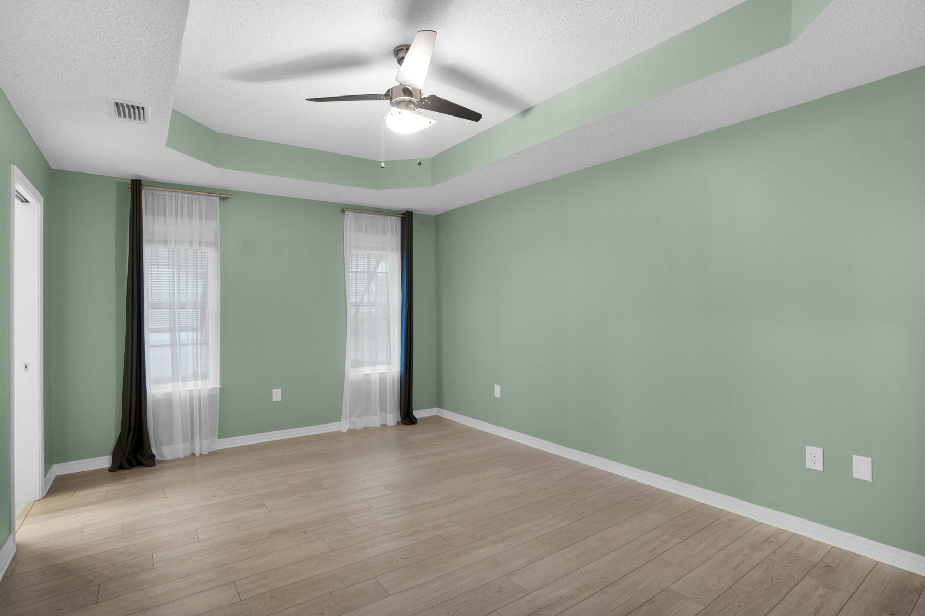 375 Bay Tree Drive Miramar Beach, FL 32550 - Photo 16 of 31 an empty room with closet and fan