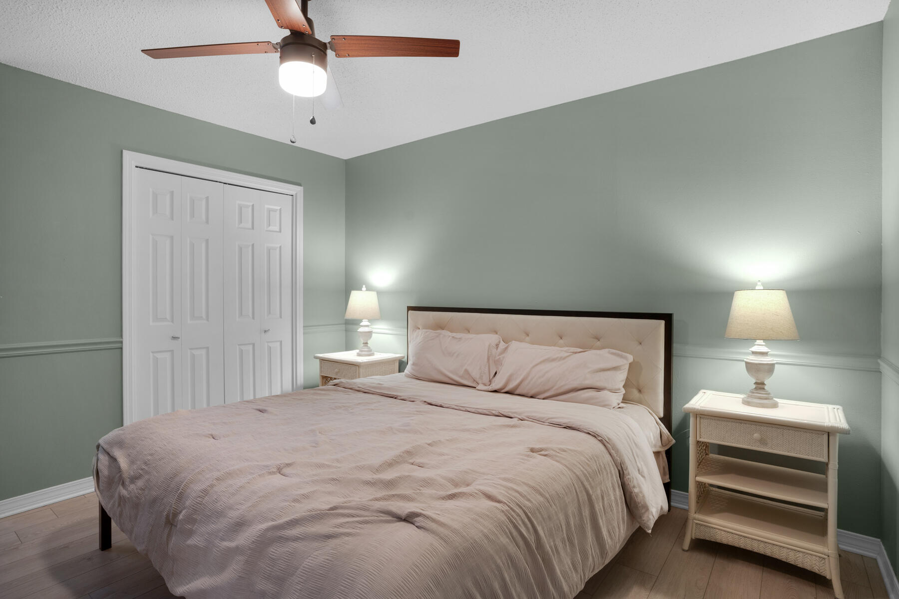 375 Bay Tree Drive Miramar Beach, FL 32550 - Photo 23 of 31 a bedroom with a bed and a chandelier