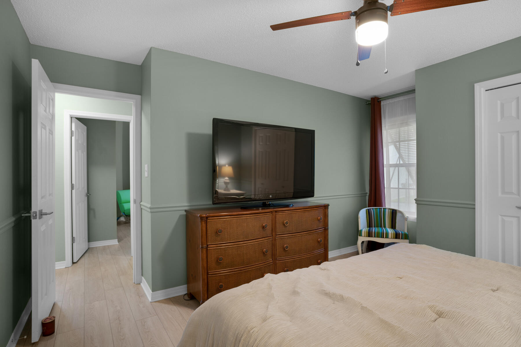 375 Bay Tree Drive Miramar Beach, FL 32550 - Photo 24 of 31 a bedroom with a bed and a flat screen tv