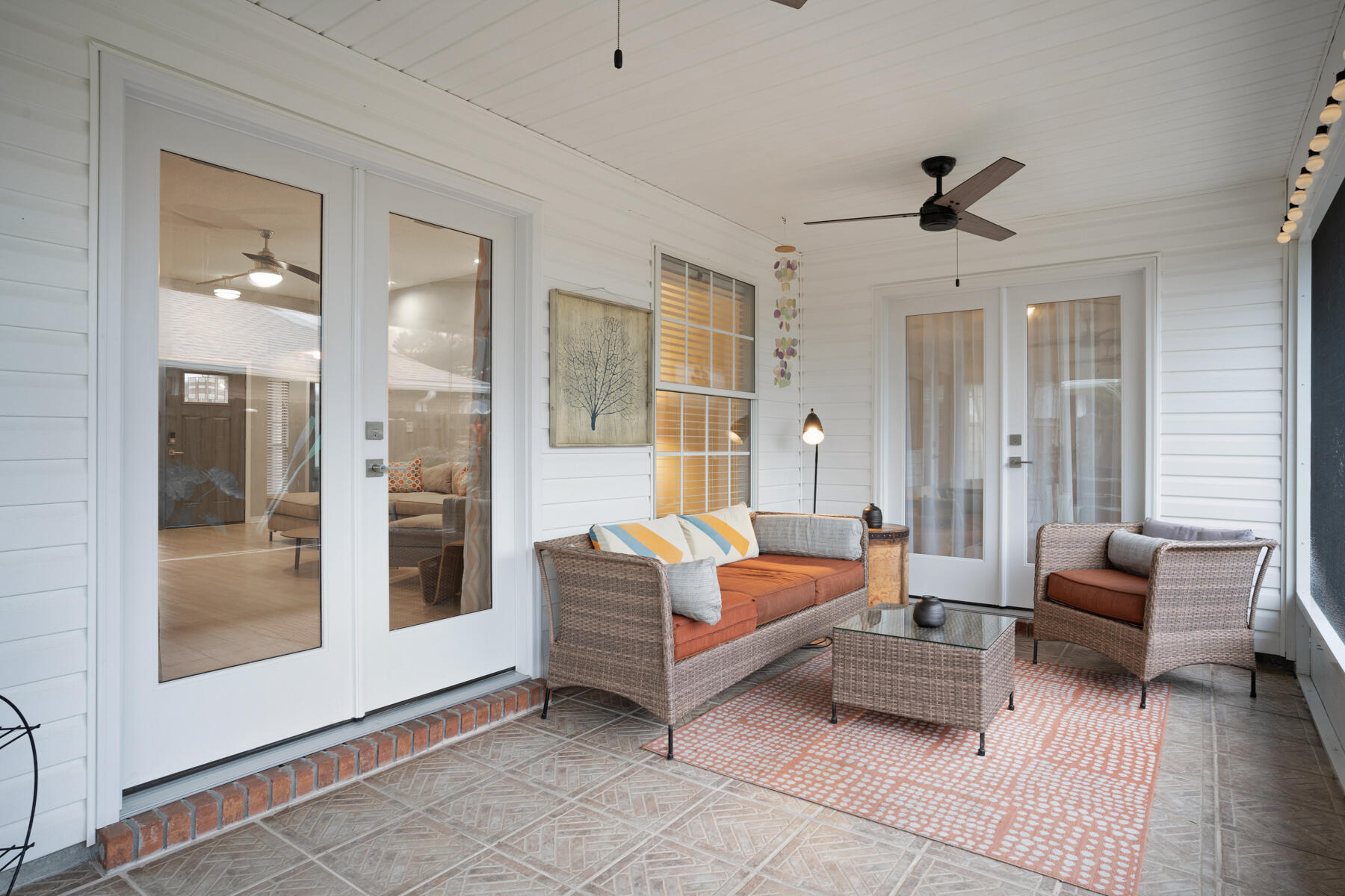 375 Bay Tree Drive Miramar Beach, FL 32550 - Photo 28 of 31 a living room with furniture and a chandelier