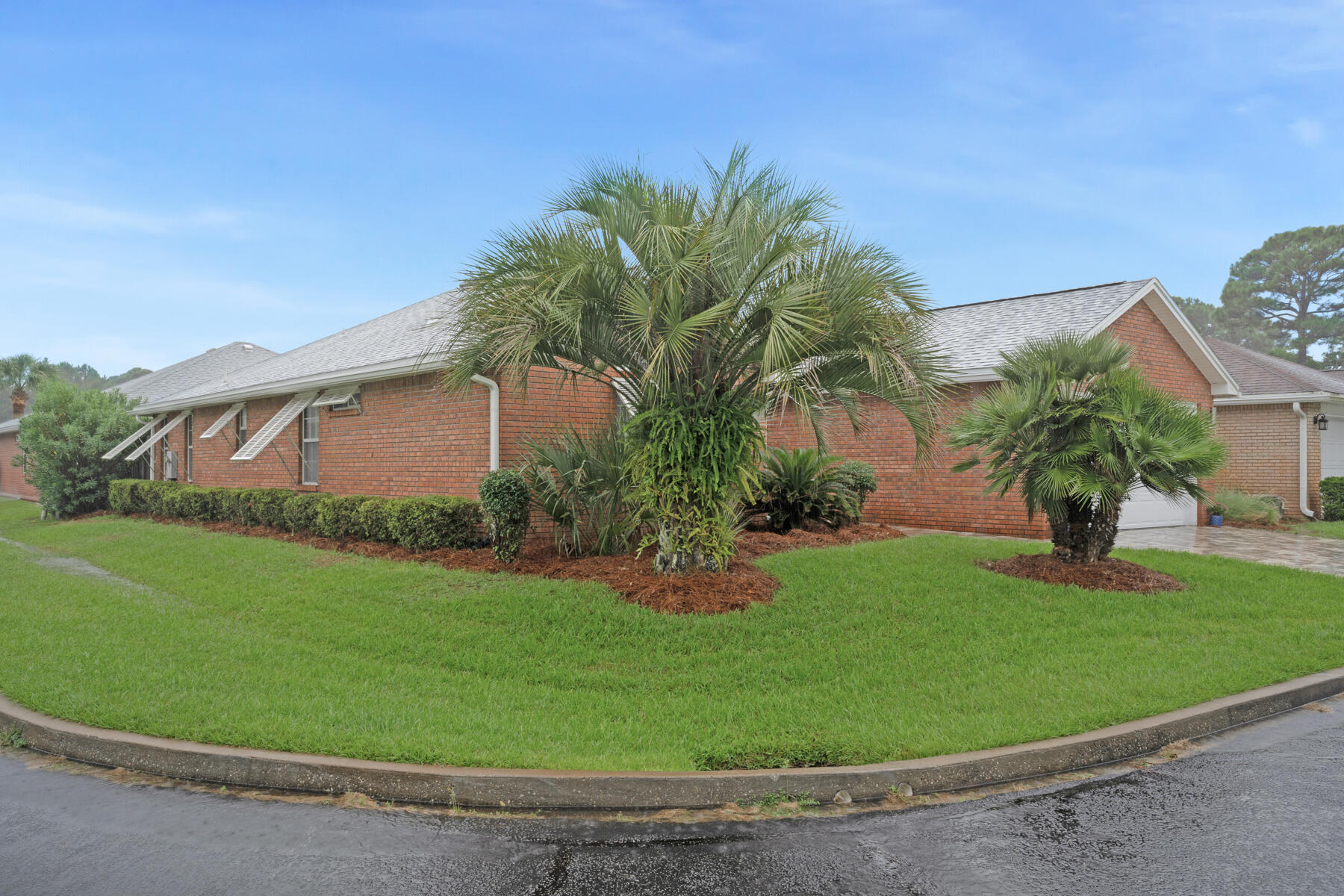 375 Bay Tree Drive Miramar Beach, FL 32550 - Photo 4 of 31 a front view of a house with garden
