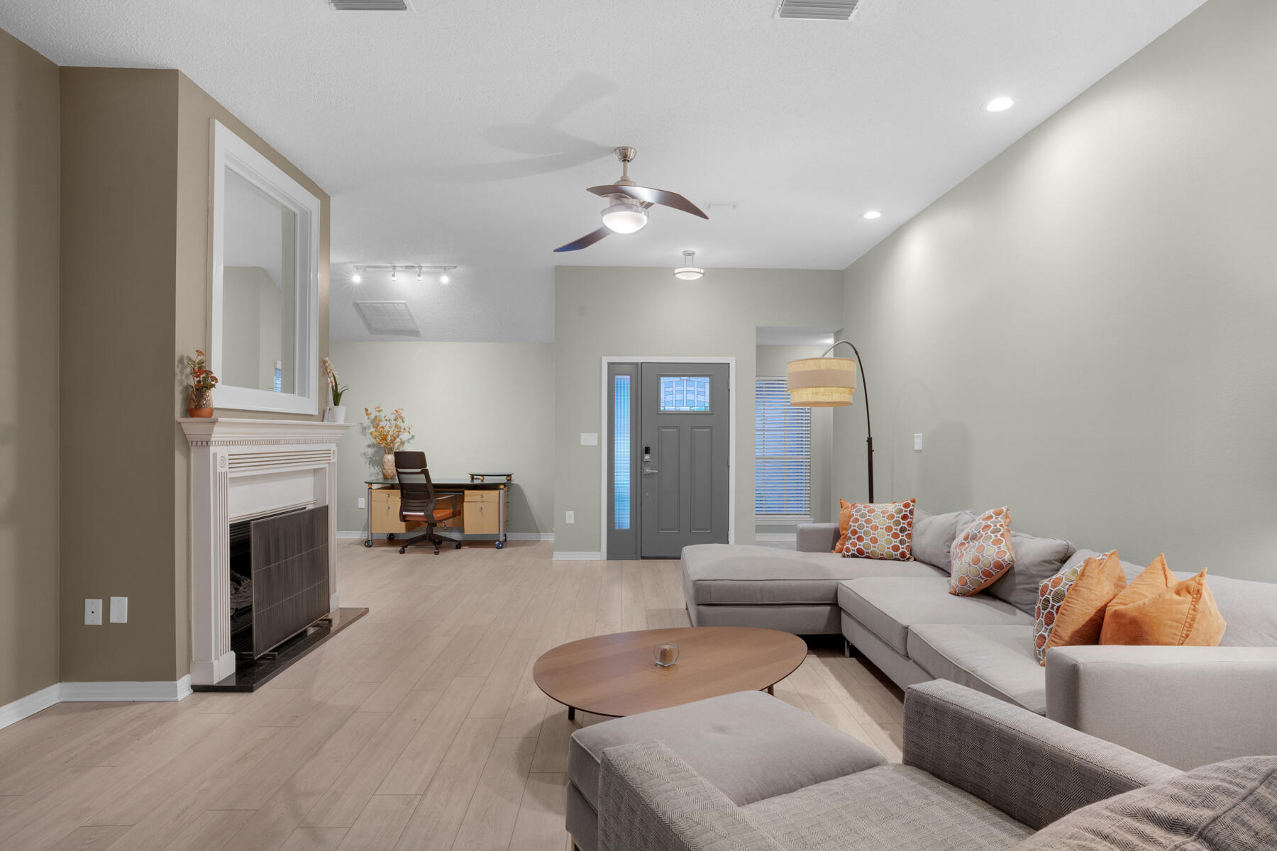 375 Bay Tree Drive Miramar Beach, FL 32550 - Photo 7 of 31 a living room with furniture fireplace and a chandelier