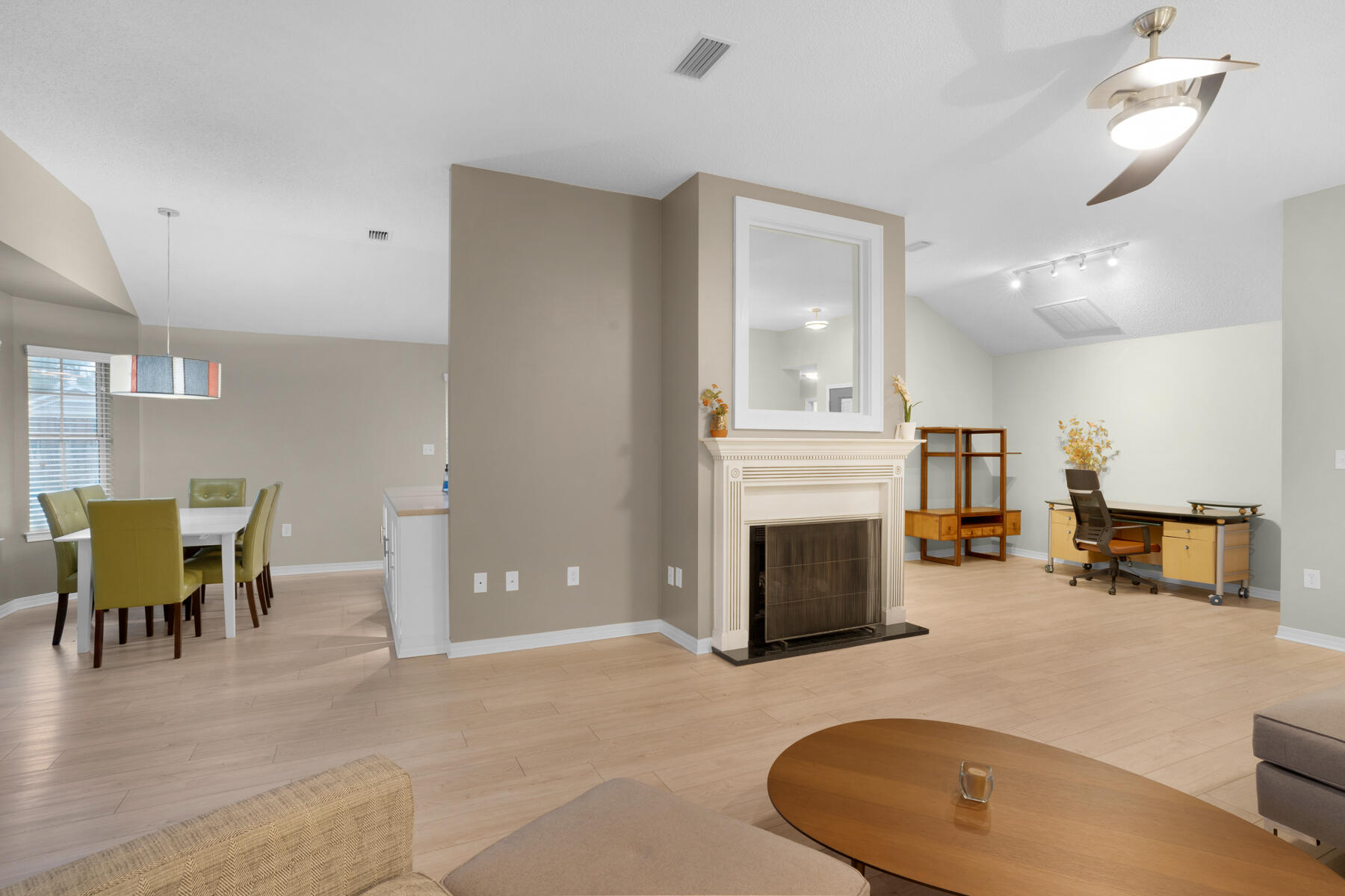 375 Bay Tree Drive Miramar Beach, FL 32550 - Photo 9 of 31 a view of a livingroom with furniture and a fireplace